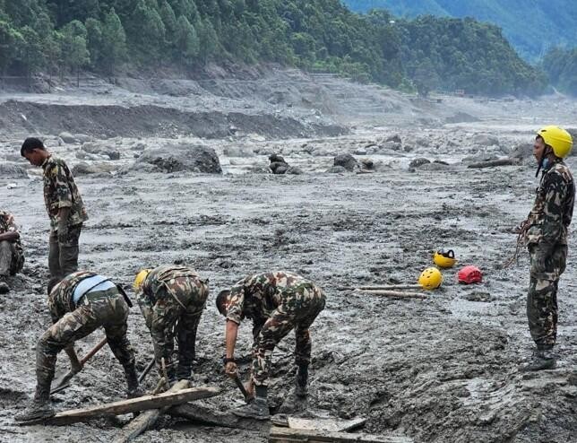 Nepal floods: 4,200 still missing as families cling to hope amid disaster